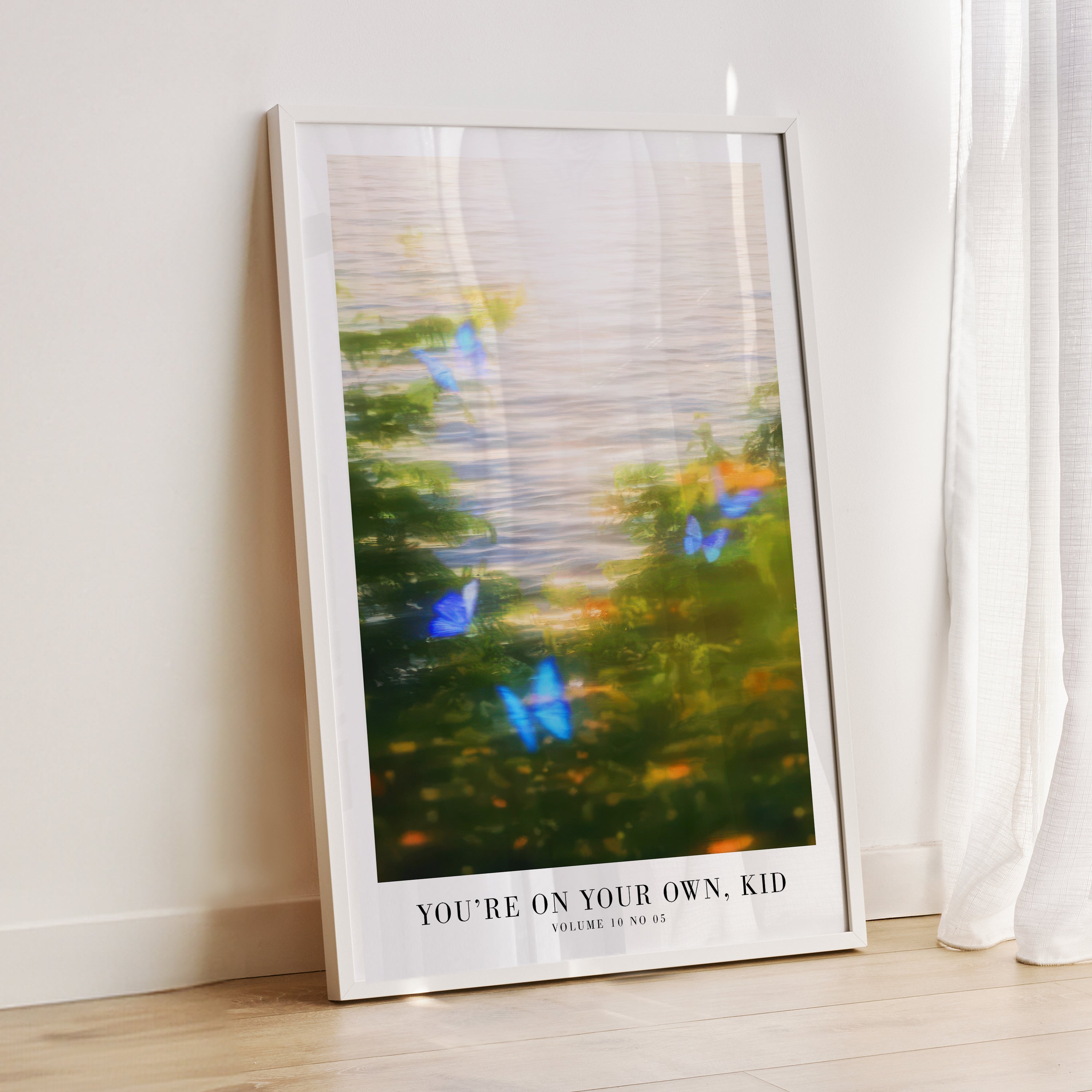 You're On Your Own Kid butterflies poster styled in romantic bedroom decor