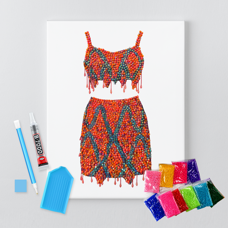 1989 orange two-piece rhinestone canvas kit shown in a styled room