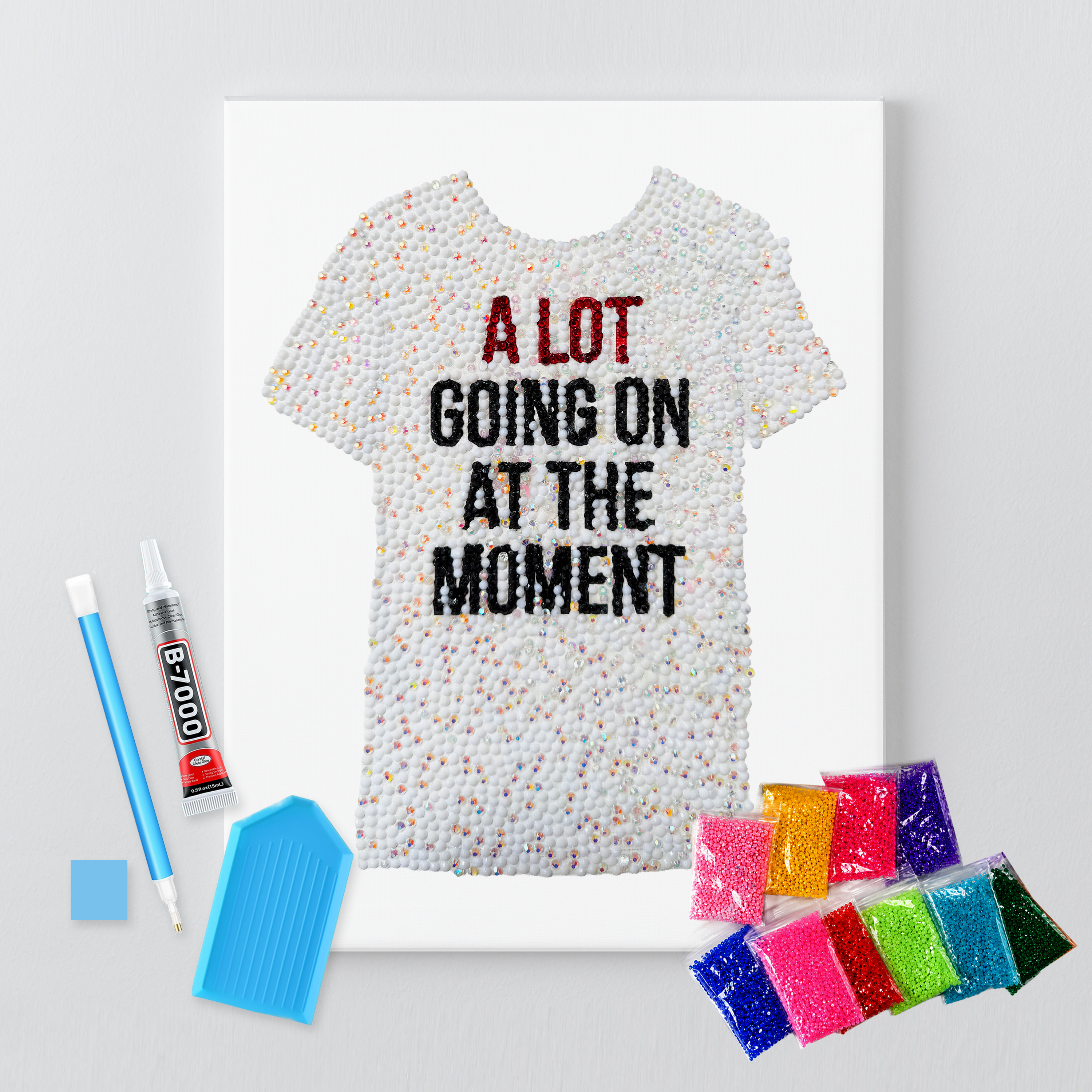 Red era slogan tee rhinestone canvas kit shown in a styled room
