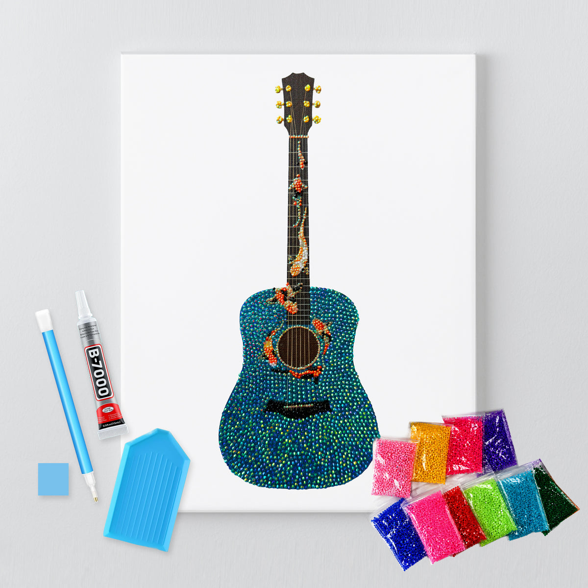 Koi fish guitar rhinestone canvas kit shown in a styled room